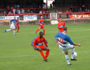 New signing Andy Hughes troublesd the Aldershot defence